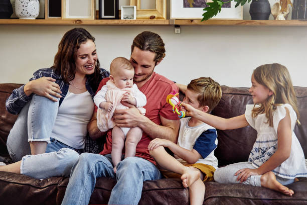 istock Getting to know their new baby sister 874880272