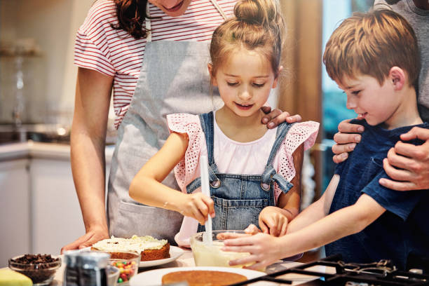 istock Nothing says bonding like baking with the family 874880654