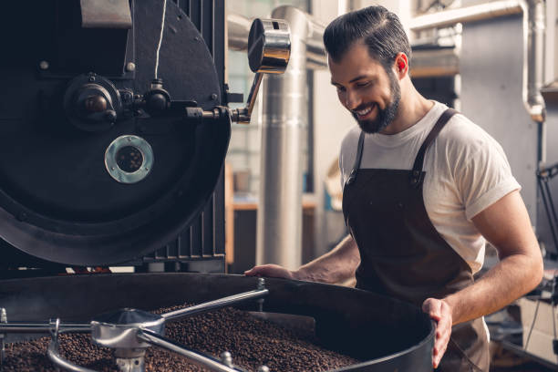 istock Cheerful male checking brown grains 874884482