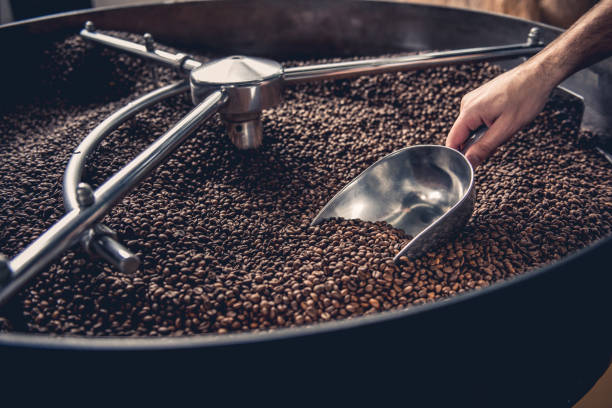 istock Male arm taking grains with special equipment 874884870
