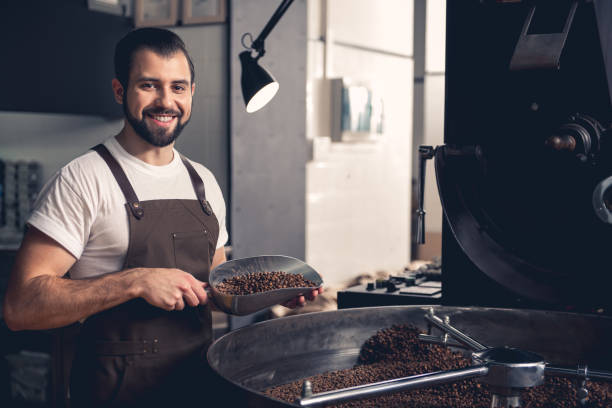 istock Cheerful unshaven male holding grains 874885008