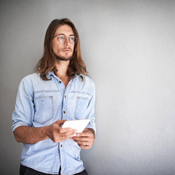 istock Thinking about how to incorporate technology with his business 874887858
