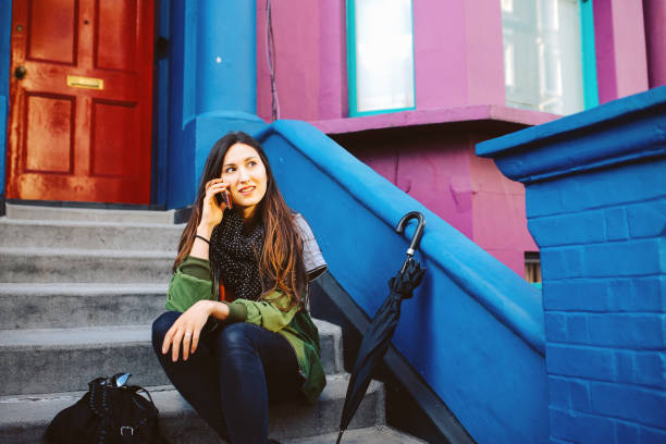 istock Young woman in central London, Notting Hill district 874888362