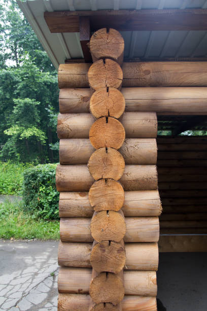 istock logs in the wall of a log house 874896204