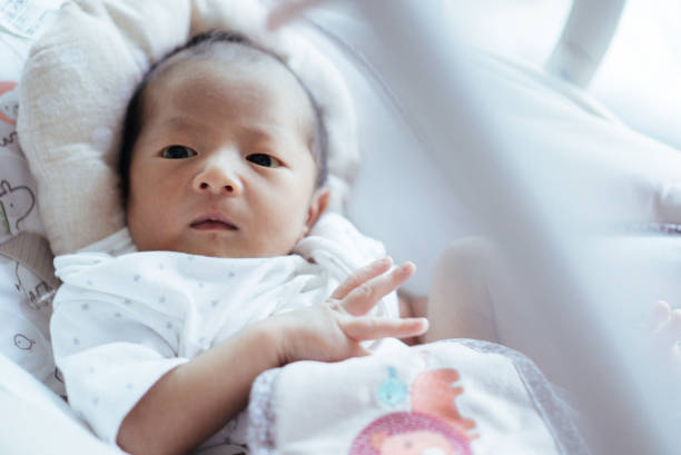 istock Baby (0-1 months) Lays in Crib 874899886