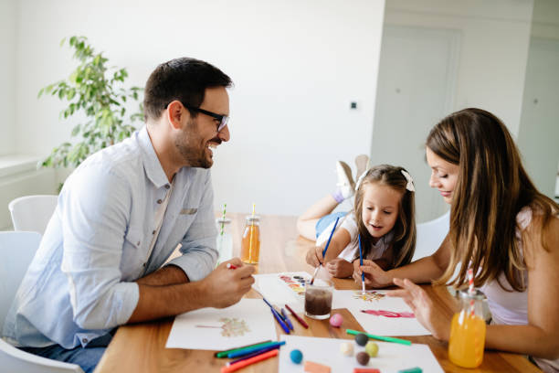 istock Happy familiy spending fun time at home 874910604