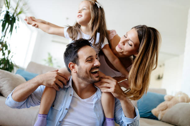 istock Happy family having fun times at home 874911746