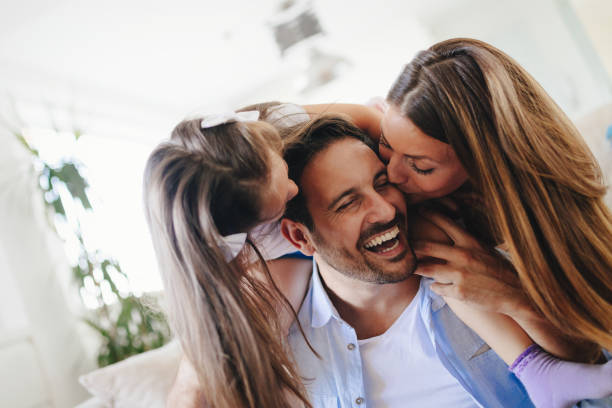 istock Happy family having fun times at home 874911836