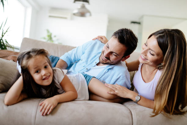 istock Happy family having fun times at home 874911908