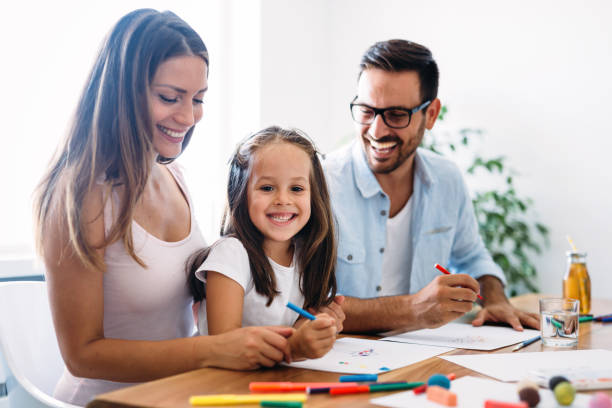 istock Happy familiy spending fun time at home 874913830