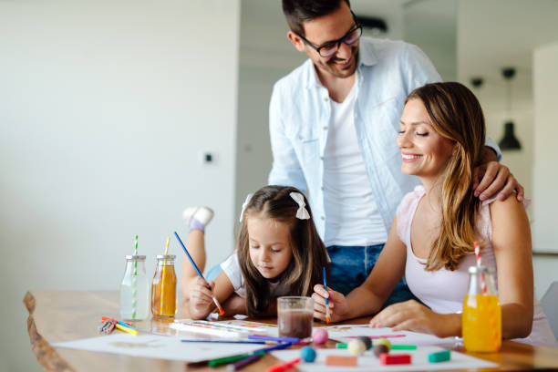istock Happy familiy spending fun time at home 874914252
