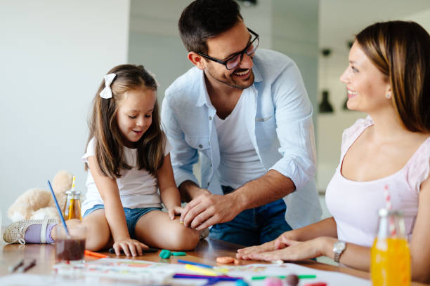 istock Happy familiy spending fun time at home 874914320