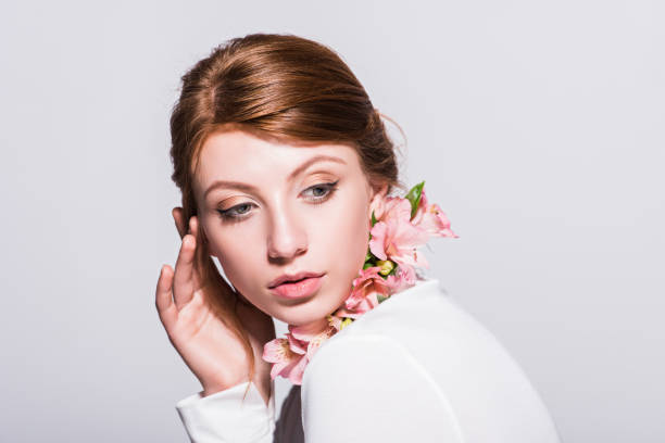 istock attractive girl with lilies 874914520