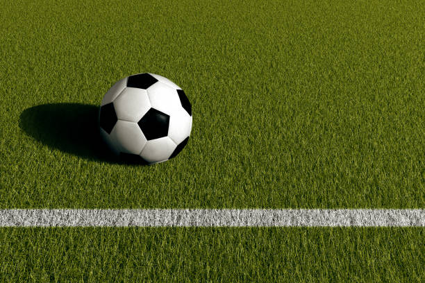 istock football field line and ball 874915414