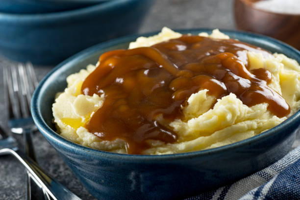 으깬된 감자와 국물 - gravy mashed potato prepared potato mashed 뉴스 사진 이미지