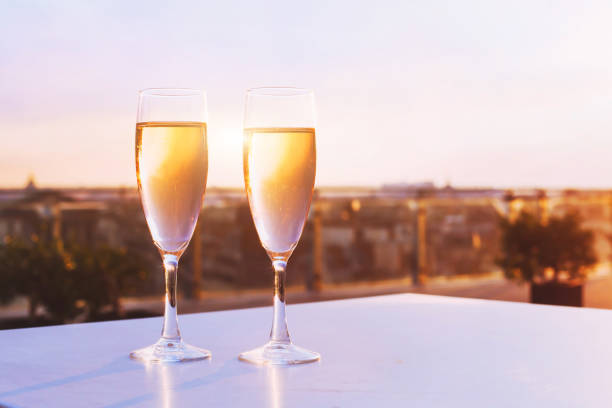 istock two glasses of champagne in restaurant 874919522
