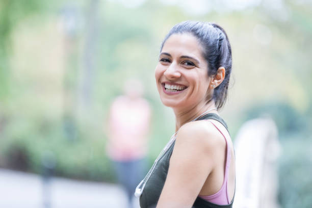 istock Happy woman smiles after a successful workout 874922486