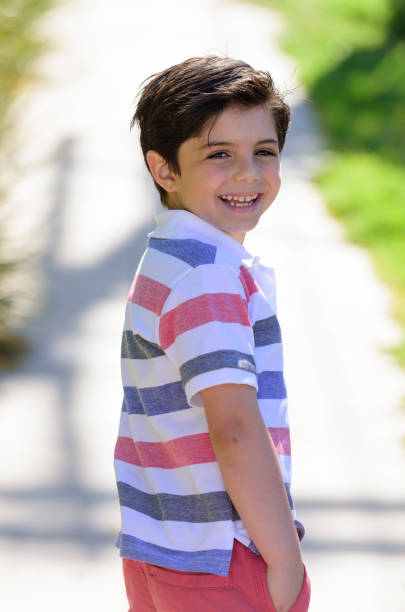 Handsome, cute young boy outdoor photoshoot