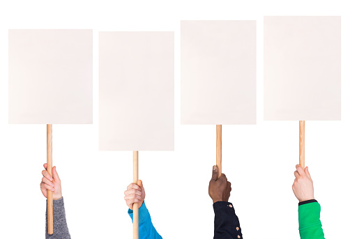 Protest signs held in hands, isolated on white background