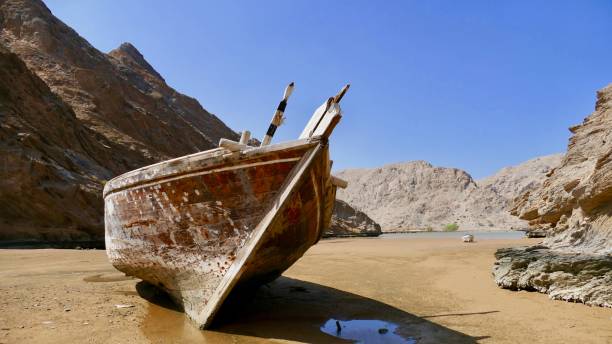 Abandoned Dhow on a baech stock photo