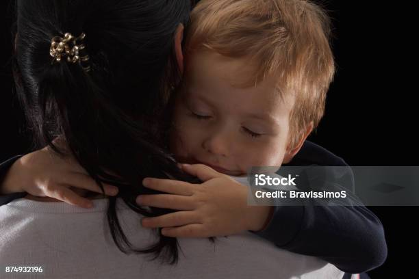 Adoption Concept An Orphan Is A Little Boy And His New Mother Happy Childhood Caring For Children Stock Photo - Download Image Now