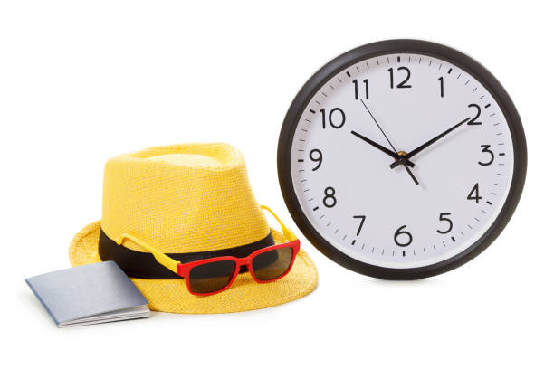 istock Vacancy concept. Clock, passport and sunglasses 874933464