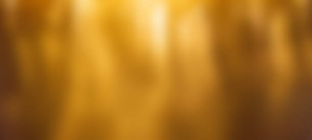 istock Golden  Christmas glowing Background. Festive Defocused lights. Blurred texture