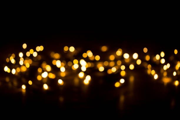 istock Christmas background with light spots and bokeh. 874934520