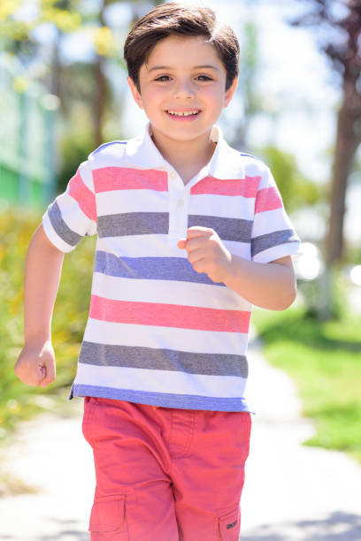 Handsome, cute young boy outdoor photoshoot