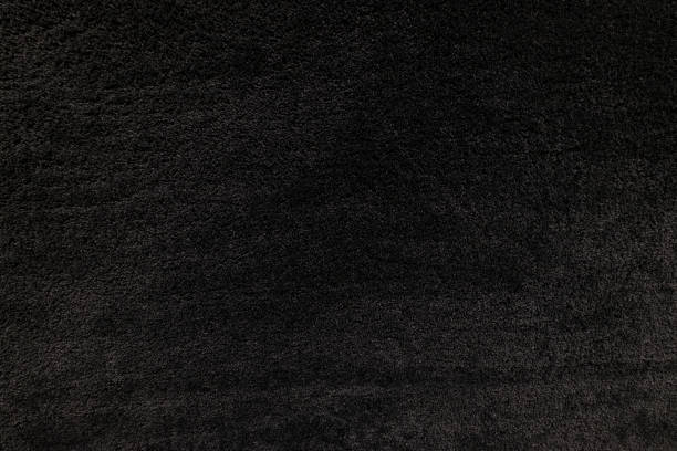 Black carpet textures with short hairs fiber for background, natural textile
