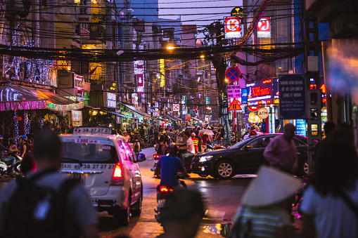 Ho Chi Minh City, Vietnam - January 03, 2016: A very crowded street at night in Ho Chi Minh City, Vietnam.