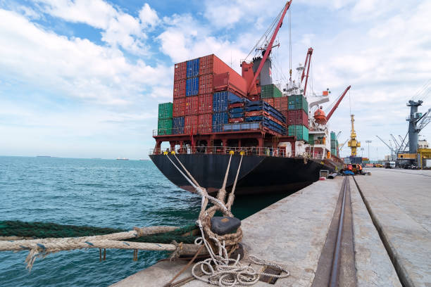 istock container ship commercial vessel alongside in port for loading and discharging containers services in maritime transports in World wide logistics 874947794
