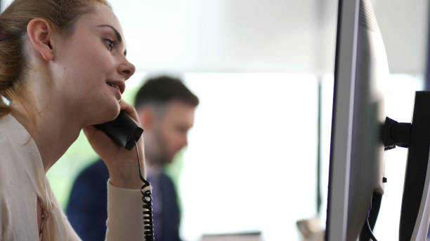 istock Office woman on phone 874950412