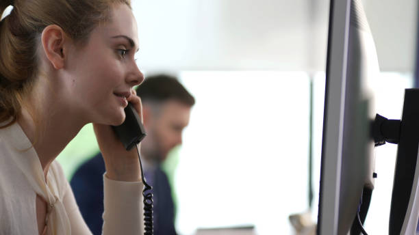 istock Office woman on phone 874950422
