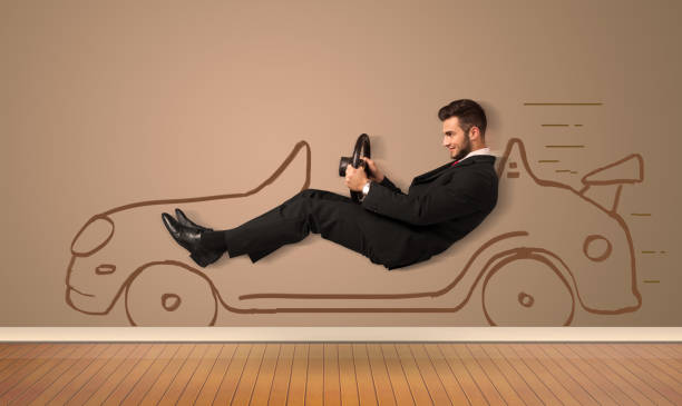 istock Happy man driving an hand drawn car on the wall 874958710