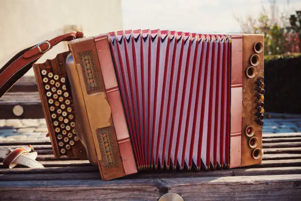 One old Austrian accordion, details of decoration.