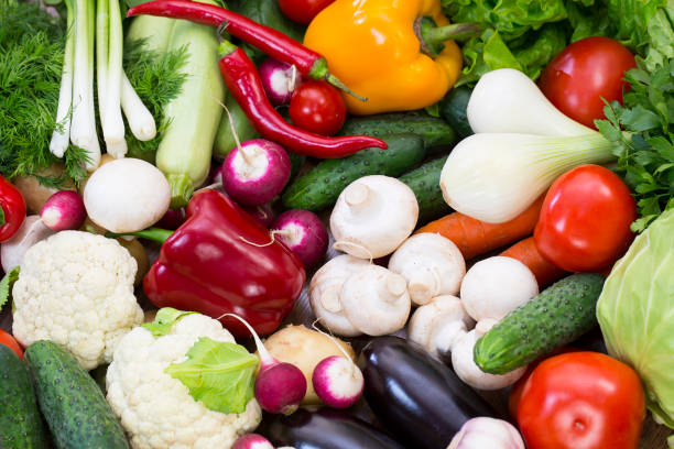 istock Background of fresh vegetables and greens 874959760