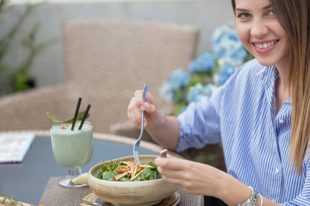 istock Woman eating healthy 874960002