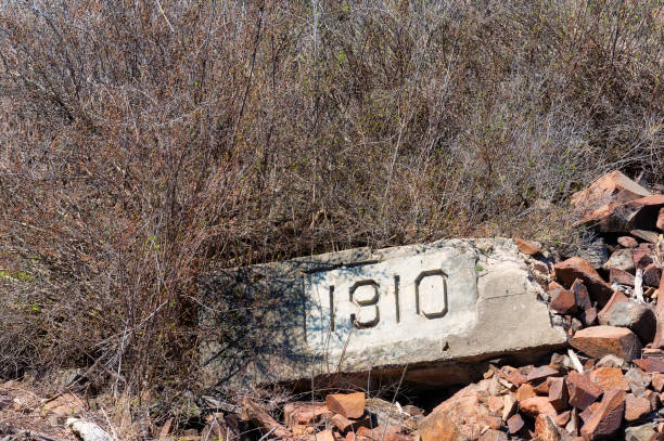 Decaying Hydropower Plant etched year block