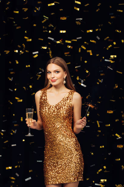 istock Smiling girl with Christmas sparkler 874963218