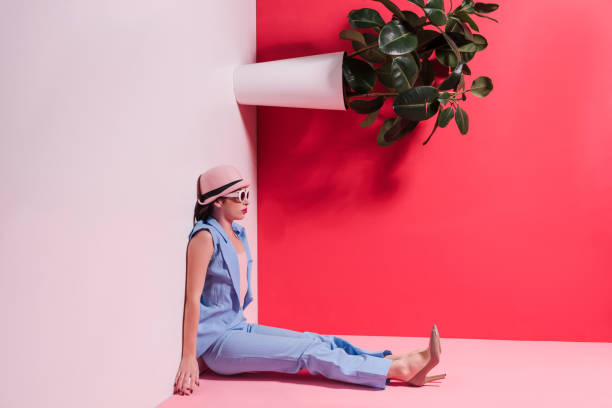 istock stylish girl in hat and sunglasses 874968042