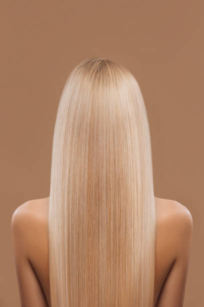 istock woman with long blond hair 874968866