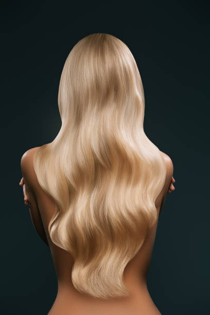 istock woman with long blond hair 874968906