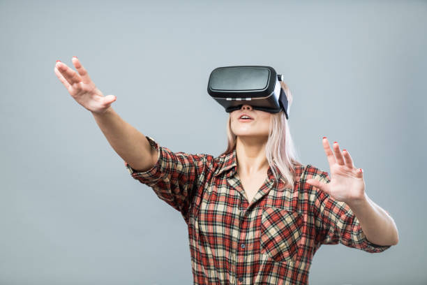 istock Young girl in virtual reality 874969388