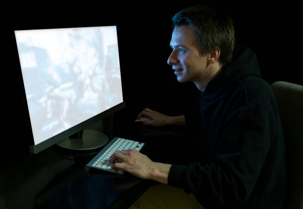 istock Young gamer playing video games 874969496