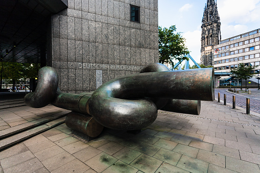 Hamburg: sculpture near office building of Deutsche Bundesbank in Hamburg city. Hamburg is the second largest city of Germany, with population of over 1,7 million people