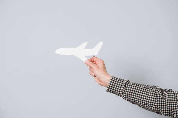 istock Paper airplane in hand 874969722