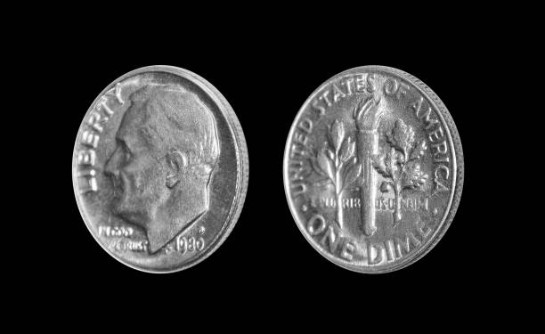 istock American one dime coin (10 cents) isolated on black background 874970122