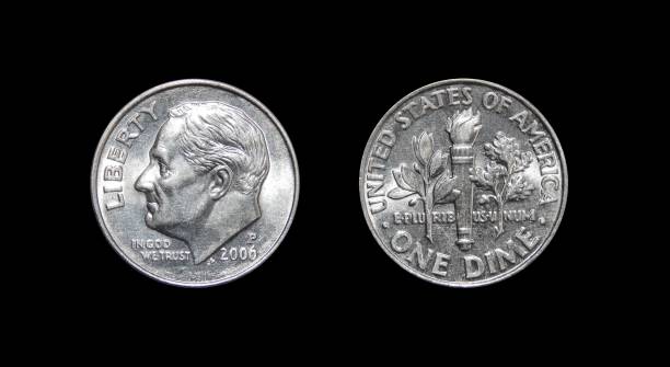 istock American one dime coin (10 cents) isolated on black background 874970128