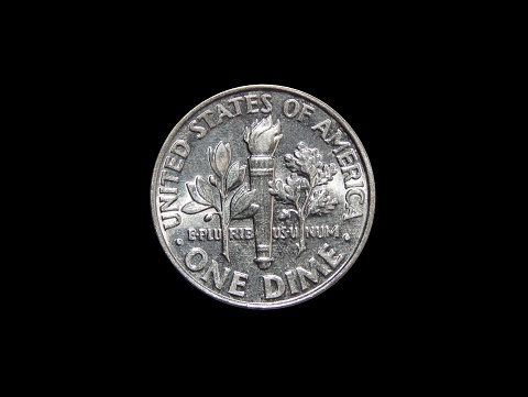 American one dime coin (10 cents) isolated on black background